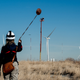 Eagle trainer, Marianne Hudson, spins a lure for Nova (Photo: Dennis Schroeder/National Renewable Energy Lab)